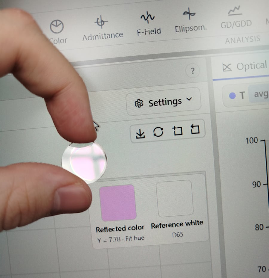 Unfinished 1064 nm mirror with 6 layers held up to the screen: its reflection shows the same pink as the Reflected color swatch